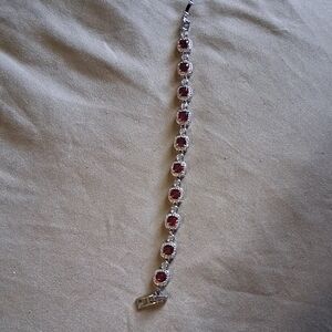 18KT WHITE GOLD OVER SILVER.WITH CRYSTALS.BRAND NEW RETAIL 299.00